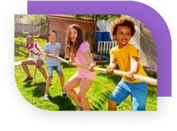 Four kids holding a rope, all pulling in the same direction for tug-of-war.